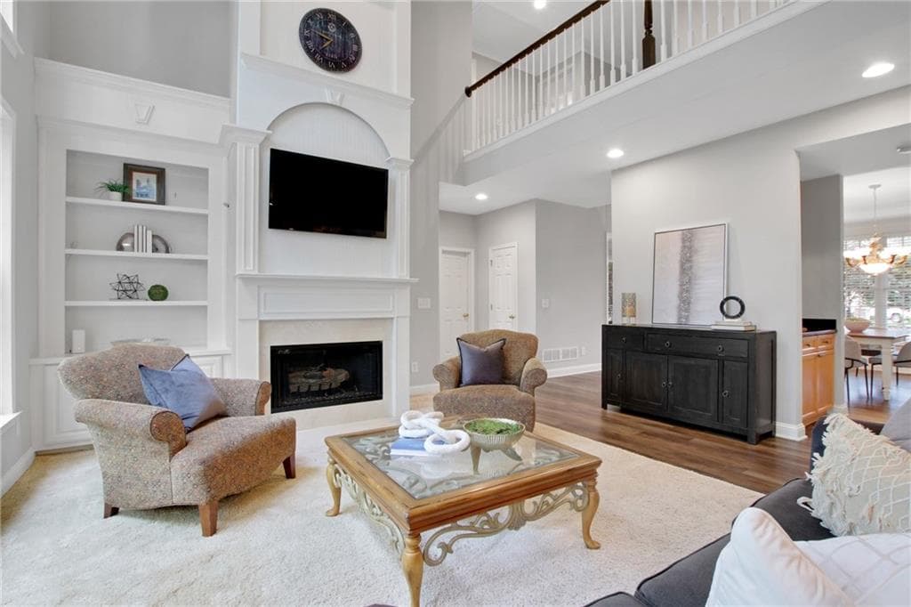 5 bedroom, 5 bathroom, 4,053 sq ft single family residence for sale at 5218 Davis Love Drive, Cumming, GA 30041 — photo 4