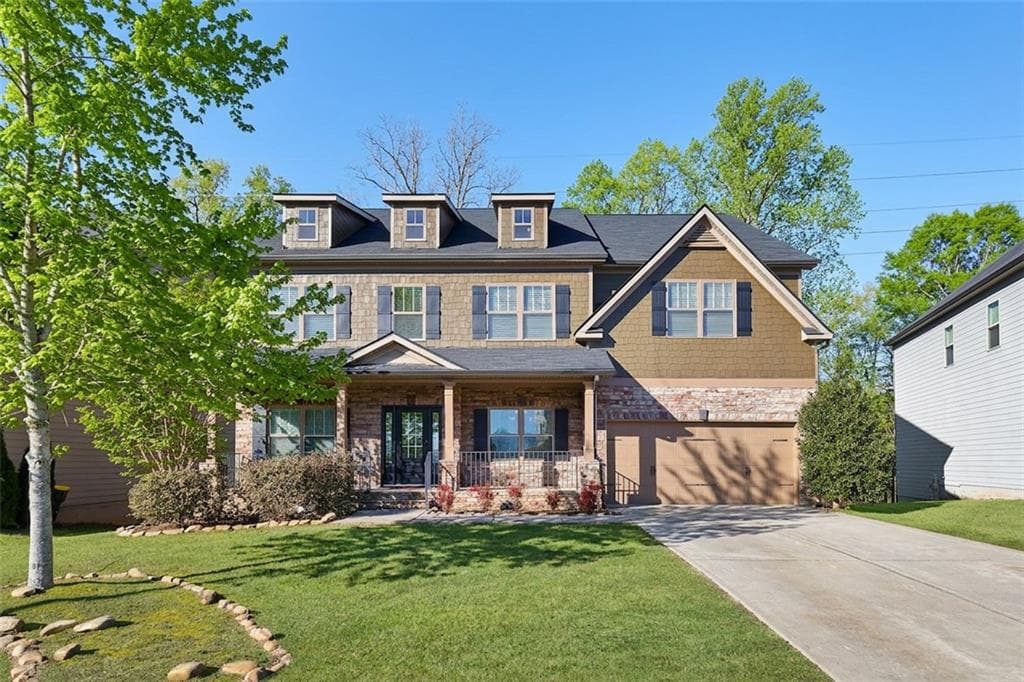 5 bedroom, 4 bathroom, 5,807 sq ft single family residence for sale at 4305 Hopewell Manor Drive, Cumming, GA 30028 — photo 1 of 25
