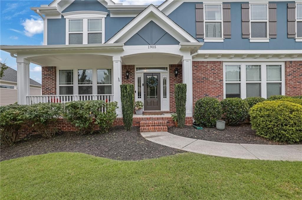 4 bedroom, 3 bathroom, 3,320 sq ft single family residence for sale at 1905 Warrington Way, Cumming, GA 30040 — photo 2