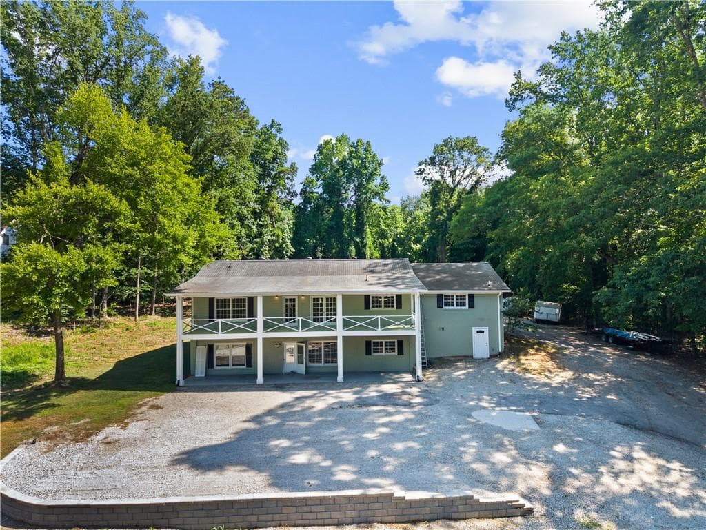 7 bedroom, 4 bathroom, 3,500 sq ft single family residence for sale at 3655 Humphries Hill Road, Austell, GA 30106 — photo 2