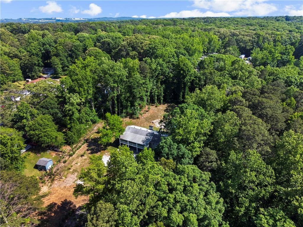 7 bedroom, 4 bathroom, 3,500 sq ft single family residence for sale at 3655 Humphries Hill Road, Austell, GA 30106 — photo 4