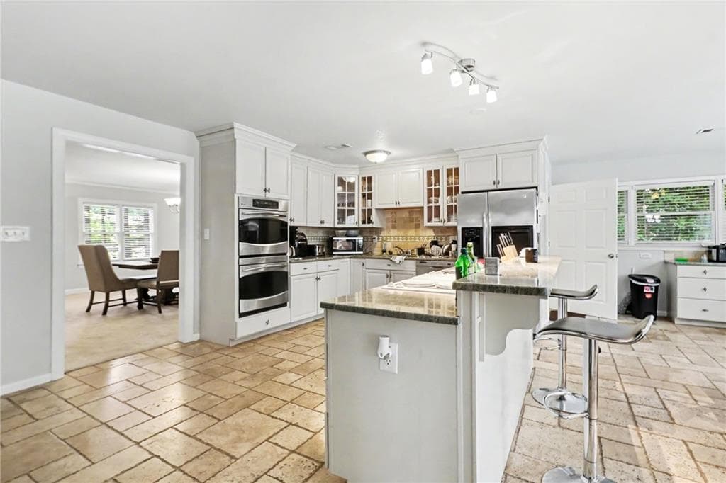 4 bedroom, 3 bathroom, 2,756 sq ft single family residence for sale at 329 Plantation Circle, Fayetteville, GA 30214 — photo 7