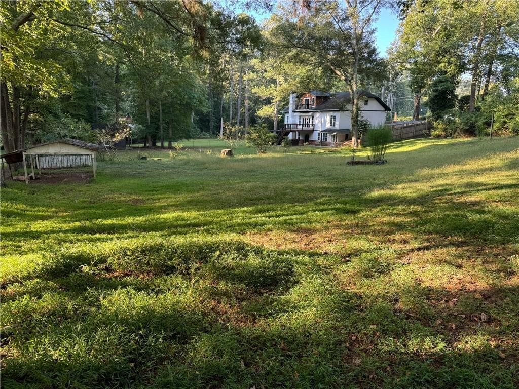 2 bedroom, 2 bathroom, 900 sq ft single family residence for sale at 14450 Cogburn Road, Milton, GA 30004 — photo 5