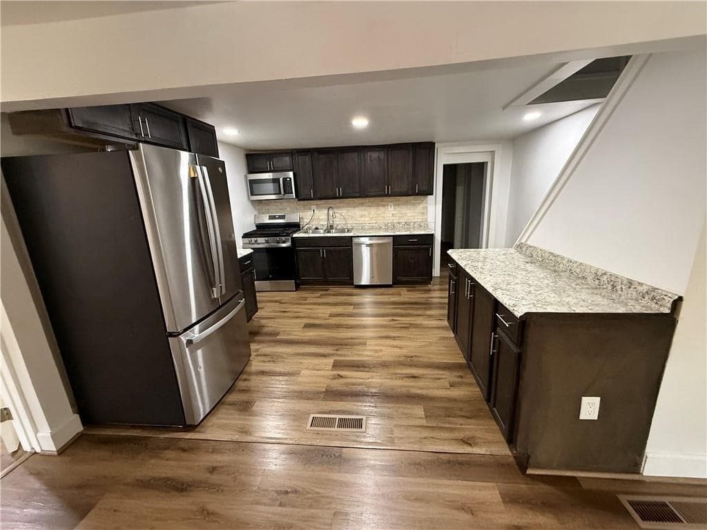4 bedroom, 2 bathroom, 1,514 sq ft single family residence for sale at 2523 Hood Avenue, Atlanta, GA 30318 — photo 4