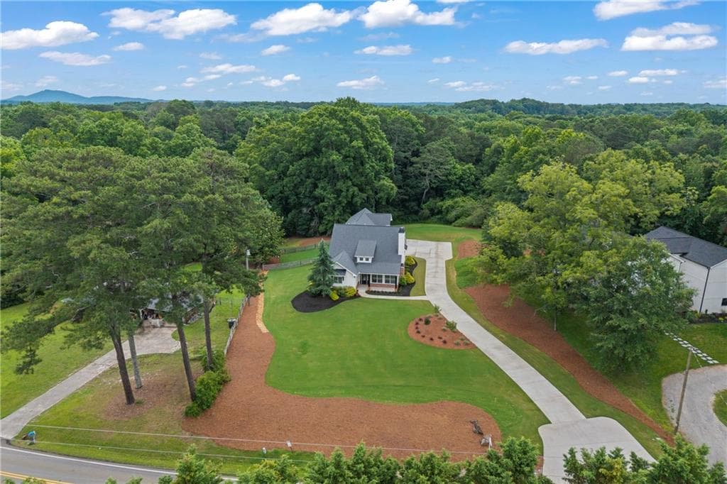 5 bedroom, 4 bathroom, 3,650 sq ft single family residence for sale at 3223 Holbrook Campground Road, Alpharetta, GA 30004 — photo 2