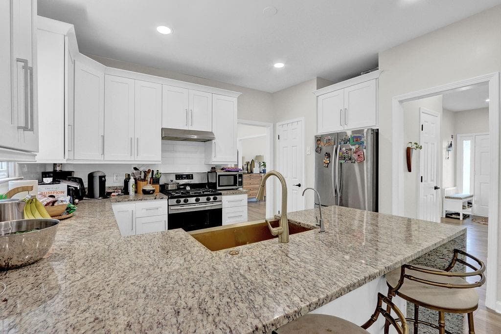 5 bedroom, 4 bathroom, 3,228 sq ft single family residence for sale at 3960 Oak Park Drive, Suwanee, GA 30024 — photo 5