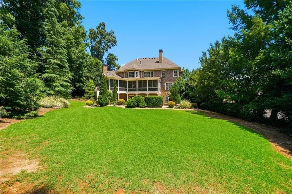 6 bedroom, 8 bathroom, 8,452 sq ft single family residence for sale at 2885 Manor Bridge Drive, Milton, GA 30004 — photo 4
