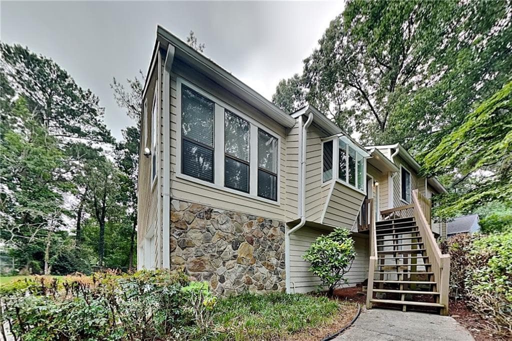 4 bedroom, 3 bathroom, 2,448 sq ft single family residence for rent at 5142 Manitou Way, Stone Mountain, GA 30087 for $2,190 a month — photo 1 of 22