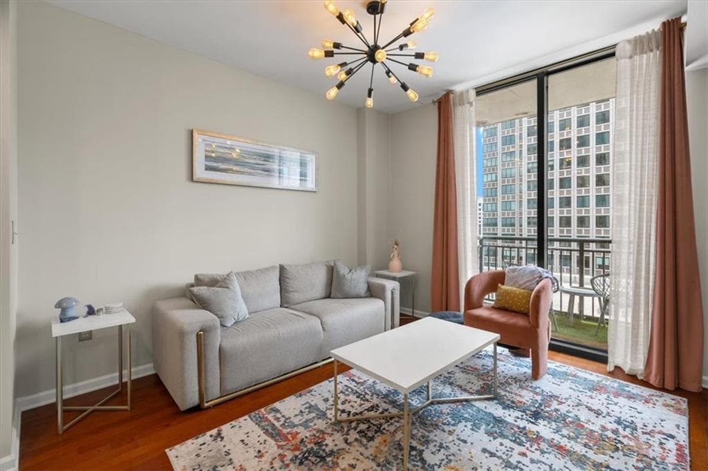 1 bedroom, 1 bathroom, 770 sq ft condominium for sale at 3040 Peachtree Road 702, Atlanta, GA 30305 — photo 1 of 32