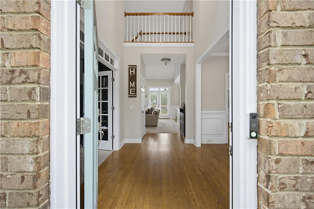 5 bedroom, 4 bathroom, 3,537 sq ft single family residence for sale at 8450 Woodland View Drive, Gainesville, GA 30506 — photo 2