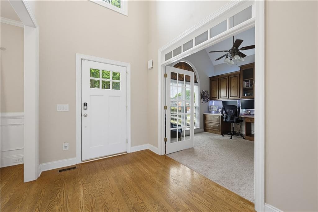 5 bedroom, 4 bathroom, 3,537 sq ft single family residence for sale at 8450 Woodland View Drive, Gainesville, GA 30506 — photo 3