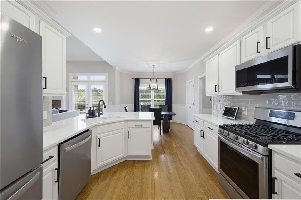 5 bedroom, 4 bathroom, 3,537 sq ft single family residence for sale at 8450 Woodland View Drive, Gainesville, GA 30506 — photo 6