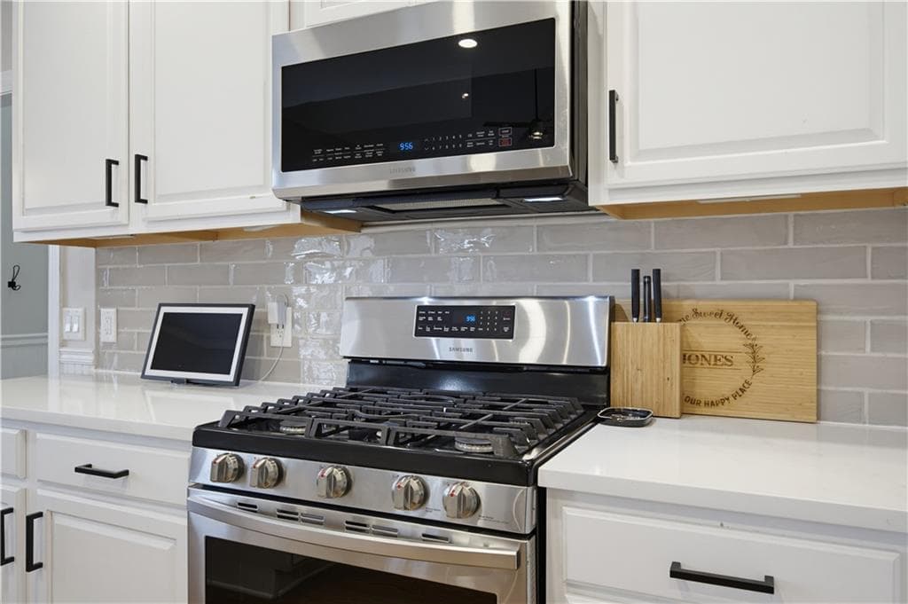5 bedroom, 4 bathroom, 3,537 sq ft single family residence for sale at 8450 Woodland View Drive, Gainesville, GA 30506 — photo 7