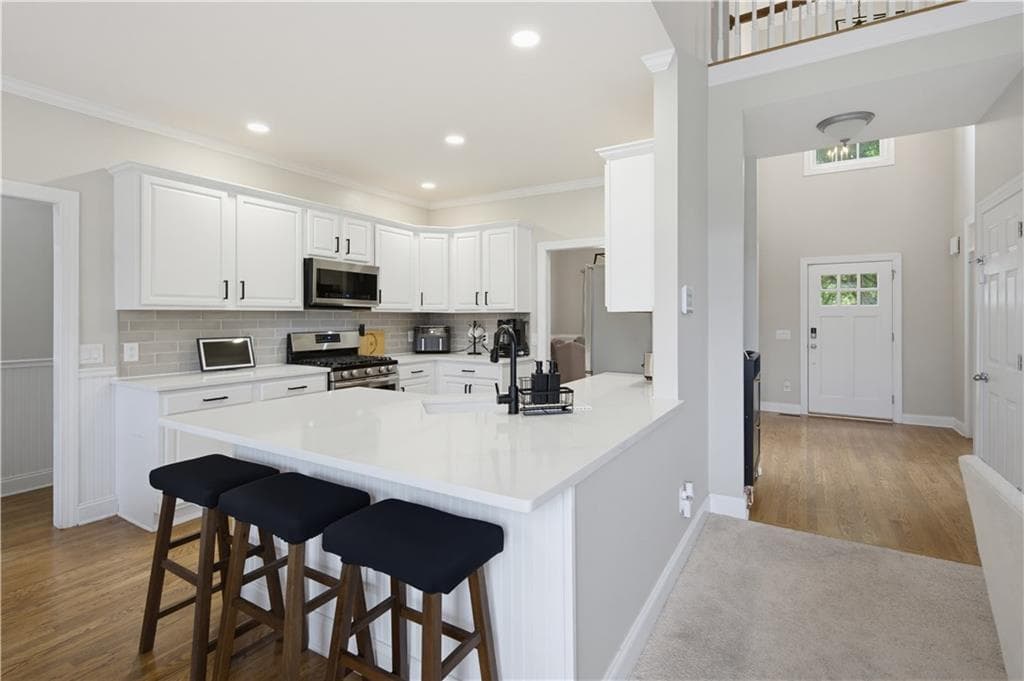 5 bedroom, 4 bathroom, 3,537 sq ft single family residence for sale at 8450 Woodland View Drive, Gainesville, GA 30506 — photo 8