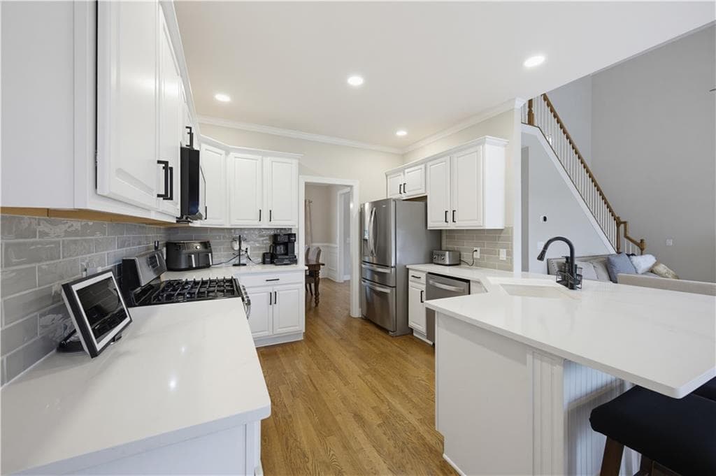 5 bedroom, 4 bathroom, 3,537 sq ft single family residence for sale at 8450 Woodland View Drive, Gainesville, GA 30506 — photo 9