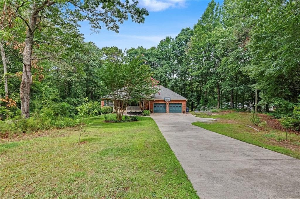 6 bedroom, 4 bathroom, 3,426 sq ft single family residence for sale at 2717 Upper Sweetwater Trail, White, GA 30184 — photo 2
