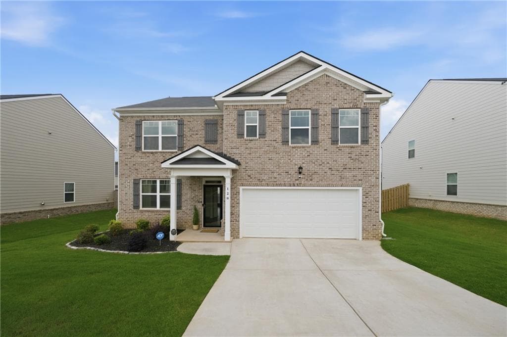 5 bedroom, 3 bathroom, 2,613 sq ft single family residence for sale at 128 Montgomery Drive, Stockbridge, GA 30281 — photo 2