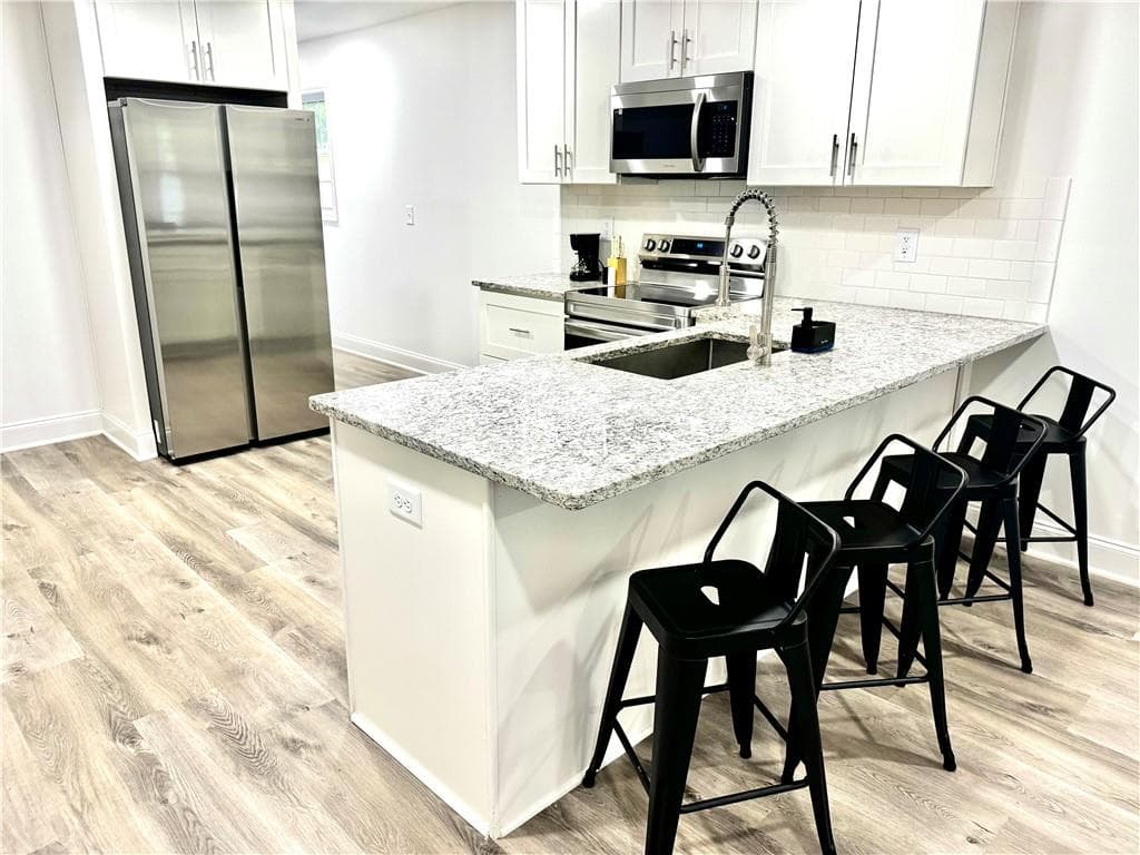 3 bedroom, 2 bathroom, 1,189 sq ft single family residence for sale at 849 Wood Street, Atlanta, GA 30318 — photo 7