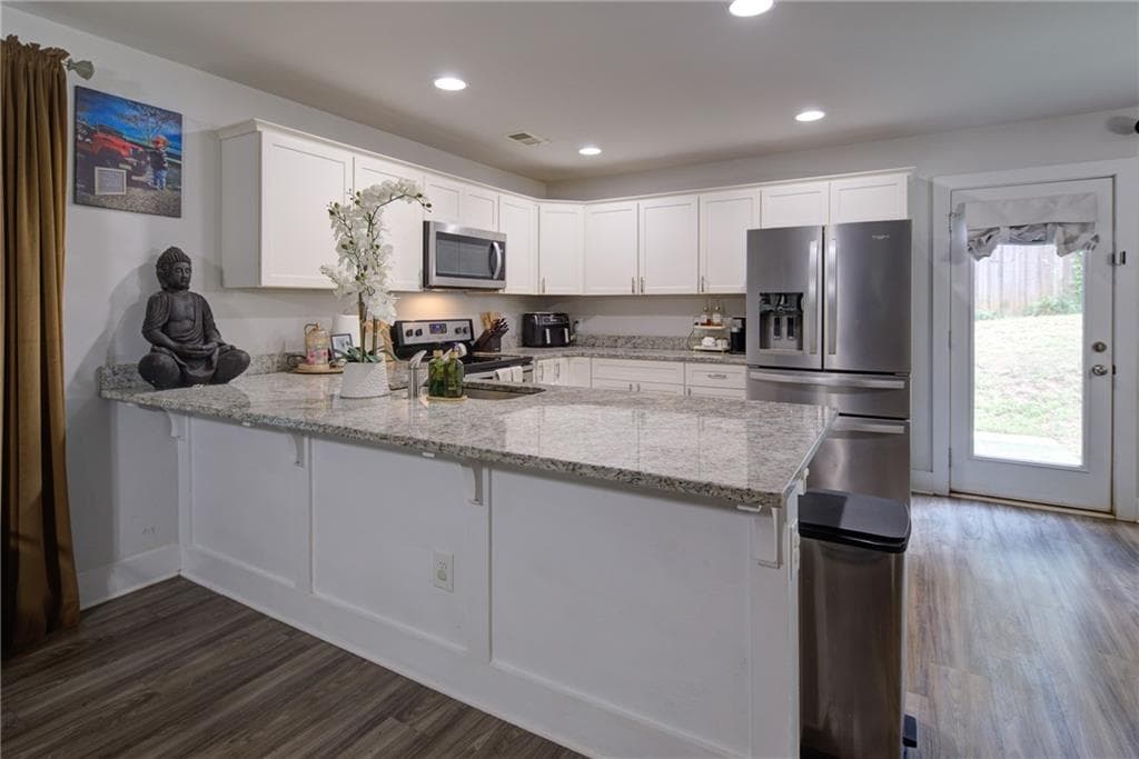 3 bedroom, 3 bathroom, 1,372 sq ft single family residence for sale at 2445 Fleetwood Drive, Cumming, GA 30041 — photo 9