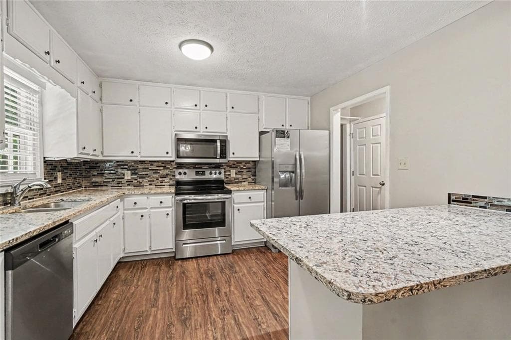 3 bedroom, 3 bathroom, 2,180 sq ft single family residence for sale at 1488 Wheeler Drive, Lawrenceville, GA 30045 — photo 6