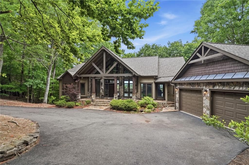 4 bedroom, 4 bathroom, 4,108 sq ft single family residence sold at 861 Summit Drive, Big Canoe, GA 30143