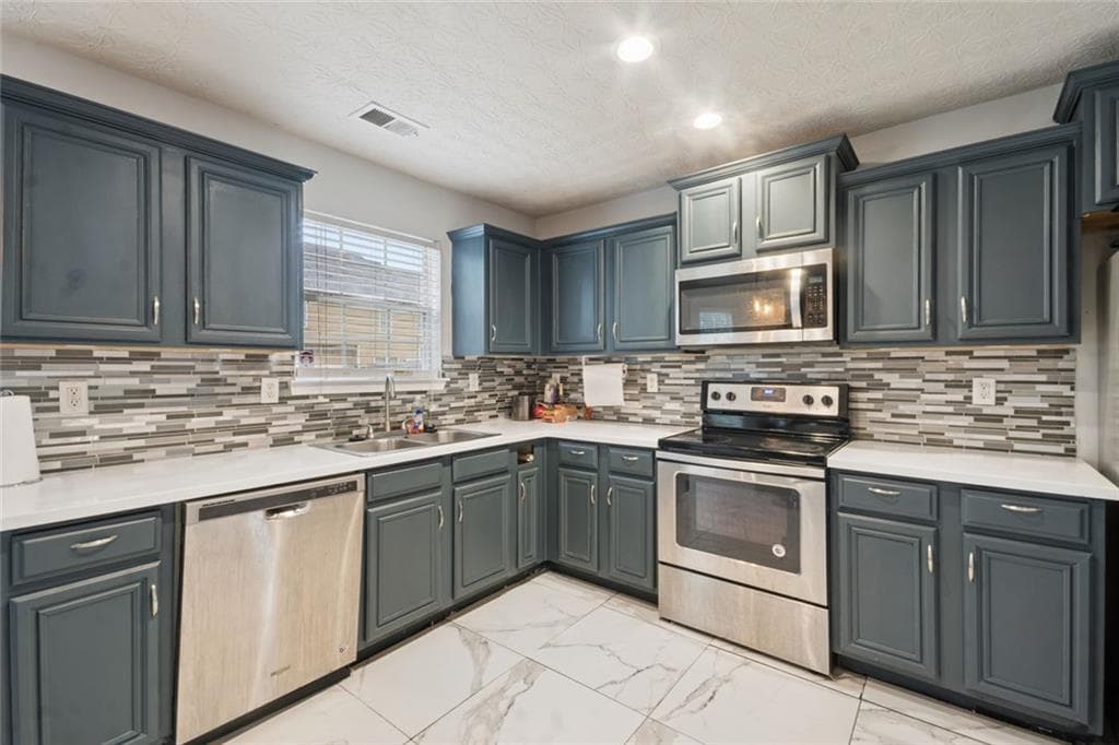 4 bedroom, 3 bathroom, 2,270 sq ft single family residence for sale at 439 Lake Ridge Lane, Fairburn, GA 30213 — photo 9