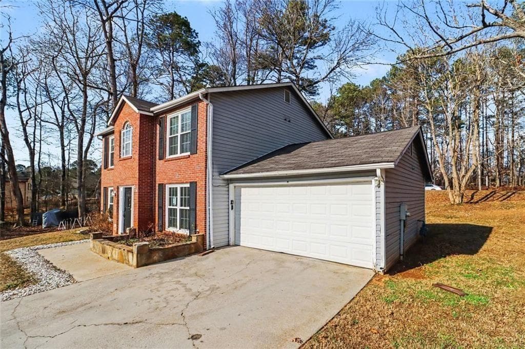 4 bedroom, 3 bathroom, 1,832 sq ft single family residence for sale at 634 Windchase Place, Lithonia, GA 30058