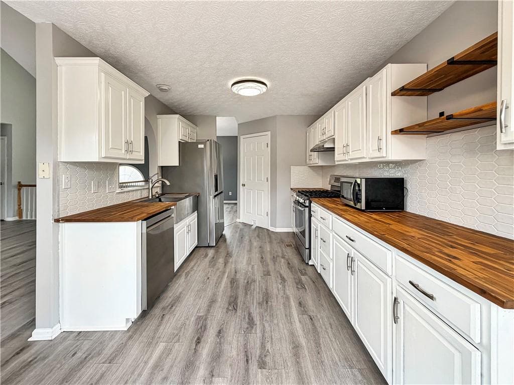 4 bedroom, 3 bathroom, 1,690 sq ft single family residence for sale at 4772 Pastry Lane, Acworth, GA 30101 — photo 6