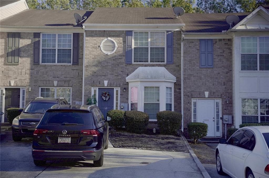 2 bedroom, 3 bathroom, 1,320 sq ft townhouse for sale at 2804 Parkway Cove, Lithonia, GA 30058