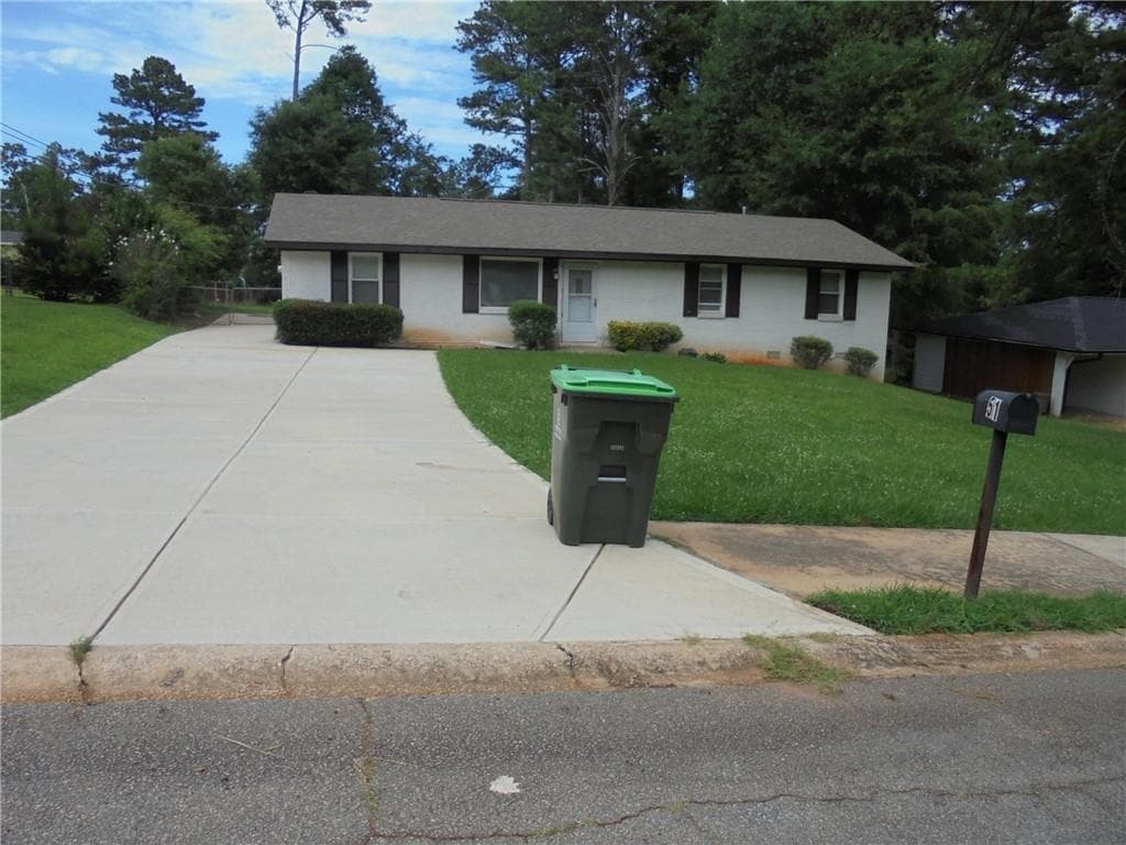 4 bedroom, 3 bathroom, 1,350 sq ft single family residence for sale at 51 Overbrook Drive, Smyrna, GA 30082 — photo 4