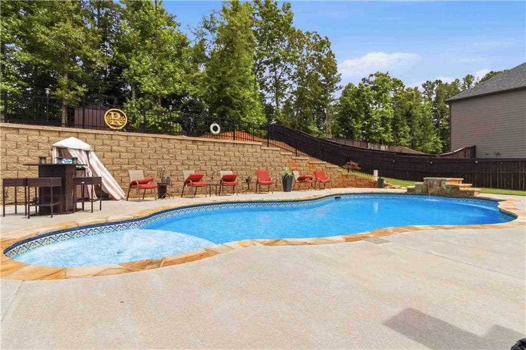 5 bedroom, 4 bathroom, 3,732 sq ft single family residence under contract at 217 Sebastian Cove, Hampton, GA 30228 — photo 4