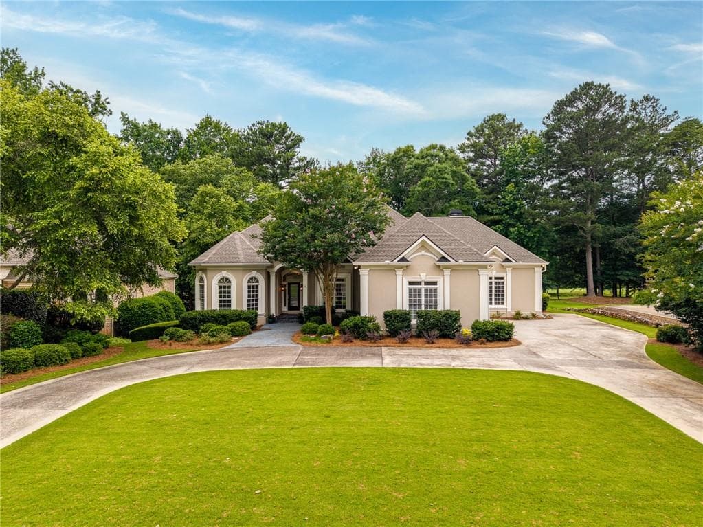 4 bedroom, 5 bathroom, 6,109 sq ft single family residence for sale at 7135 Sheffield Place, Cumming, GA 30040