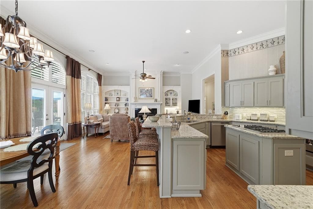 4 bedroom, 5 bathroom, 6,109 sq ft single family residence for sale at 7135 Sheffield Place, Cumming, GA 30040 — photo 6