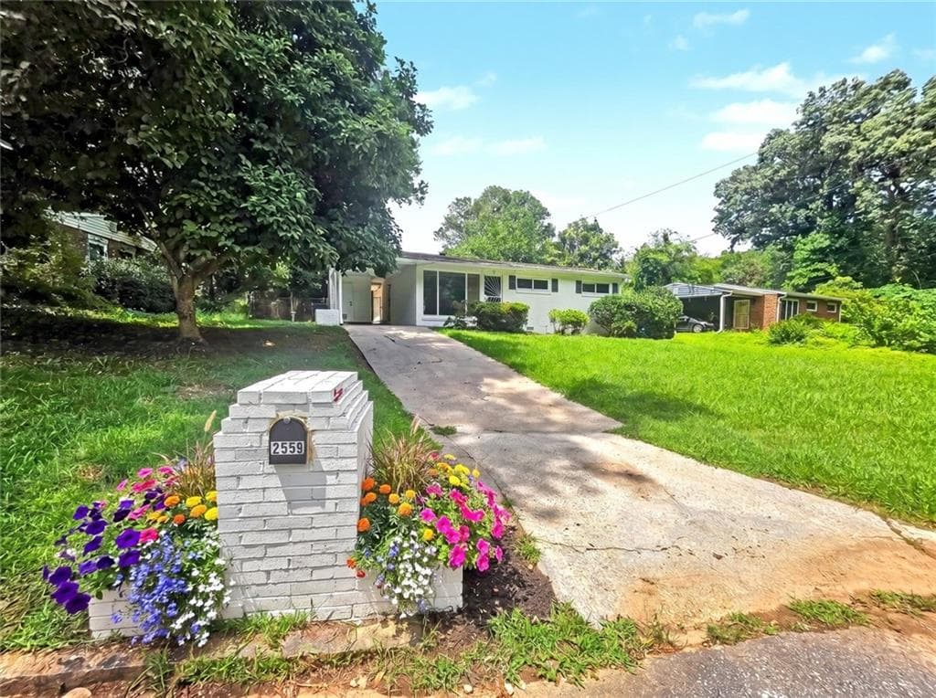 3 bedroom, 2 bathroom, 1,296 sq ft single family residence for sale at 2559 Dale Creek Drive, Atlanta, GA 30318 — photo 1 of 44
