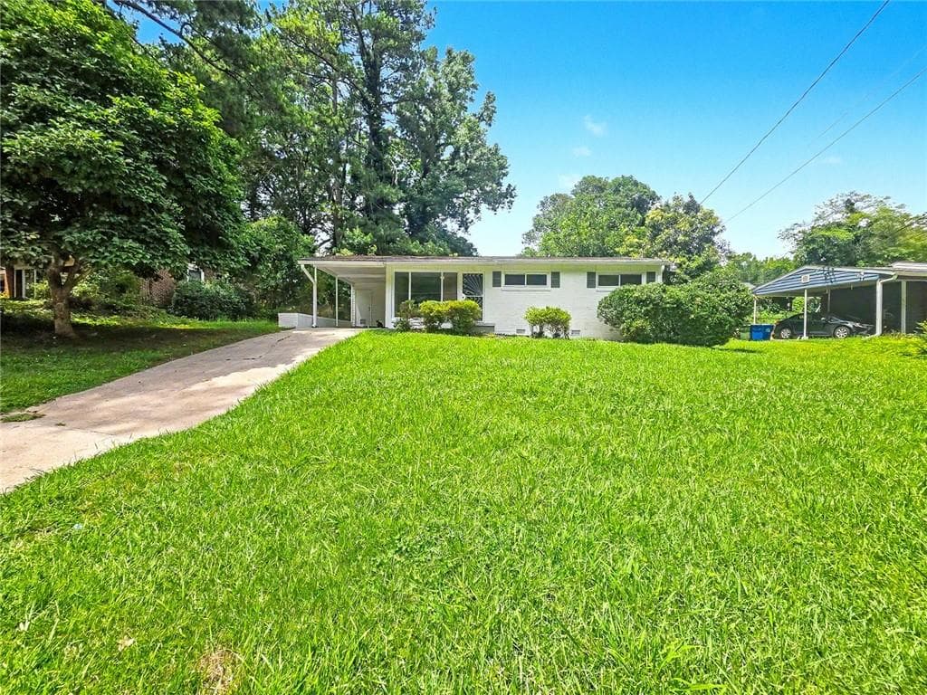3 bedroom, 2 bathroom, 1,296 sq ft single family residence for sale at 2559 Dale Creek Drive, Atlanta, GA 30318 — photo 2