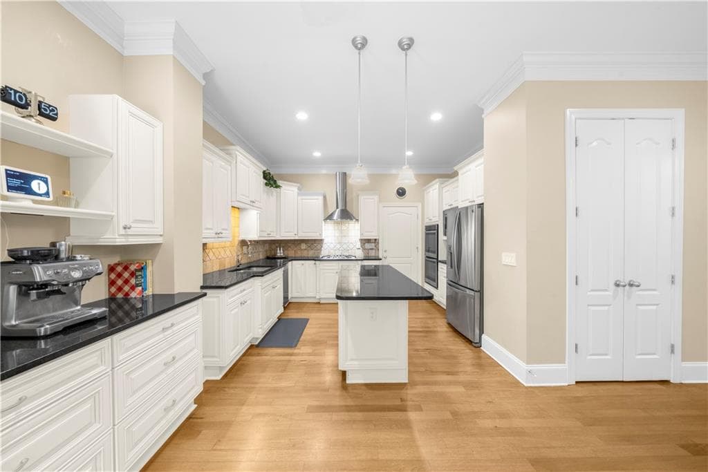 6 bedroom, 5 bathroom, 5,584 sq ft single family residence for sale at 7530 Wandering Oak Way, Cumming, GA 30041 — photo 10