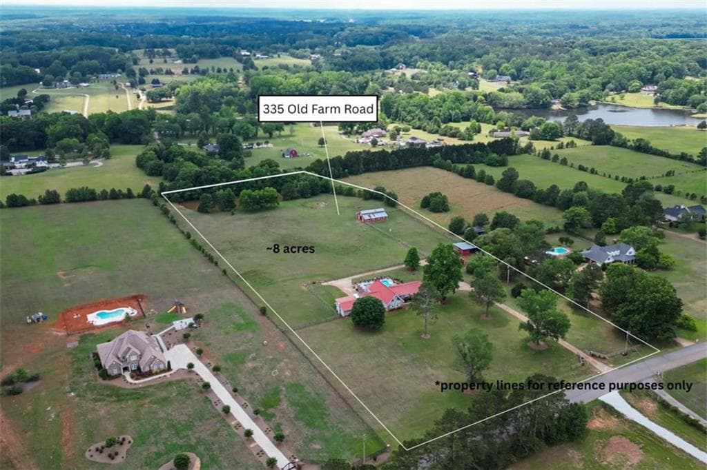 3 bedroom, 3 bathroom, 5,447 sq ft single family residence for sale at 335 Old Farm Road, Fayetteville, GA 30215 — photo 2