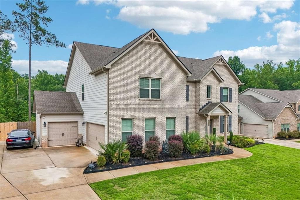 5 bedroom, 4 bathroom, 3,848 sq ft single family residence for sale at 415 Traditions Lane, Hampton, GA 30228 — photo 3