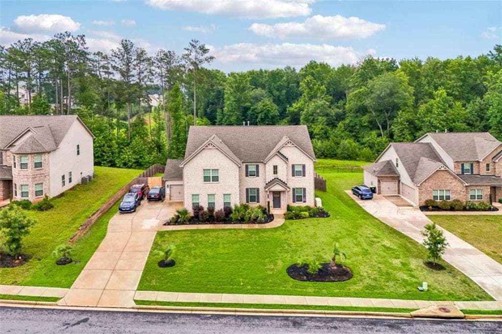 5 bedroom, 4 bathroom, 3,848 sq ft single family residence for sale at 415 Traditions Lane, Hampton, GA 30228 — photo 4