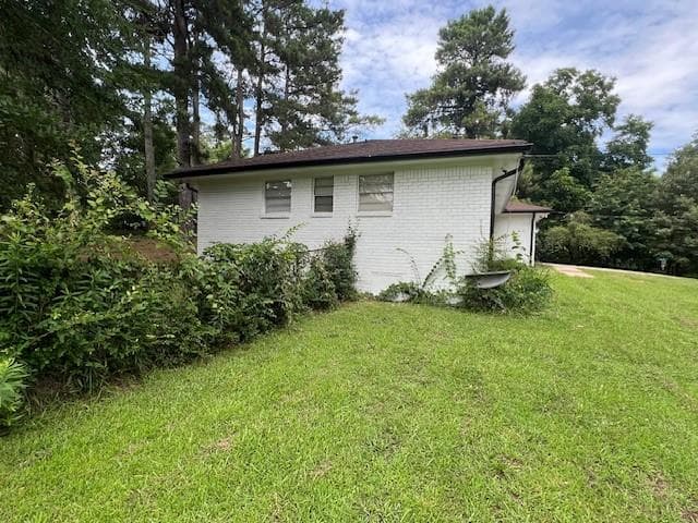 3 bedroom, 2 bathroom, 1,209 sq ft single family residence for sale at 6935 Fielder Road, Rex, GA 30273 — photo 4