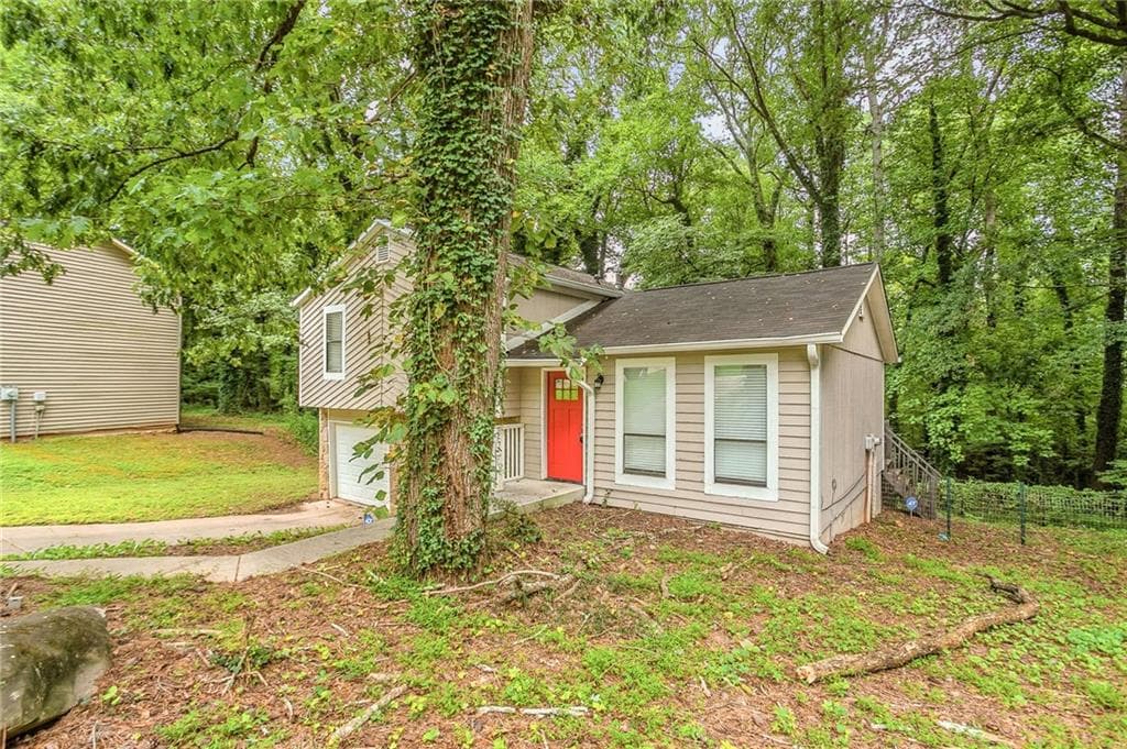 4 bedroom, 2 bathroom, 1,448 sq ft single family residence for sale at 4645 Hairston Crossing Place, Stone Mountain, GA 30083 — photo 3