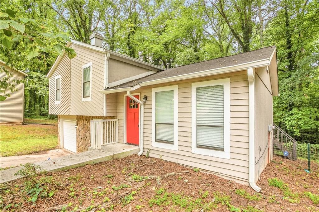 4 bedroom, 2 bathroom, 1,448 sq ft single family residence for sale at 4645 Hairston Crossing Place, Stone Mountain, GA 30083 — photo 4