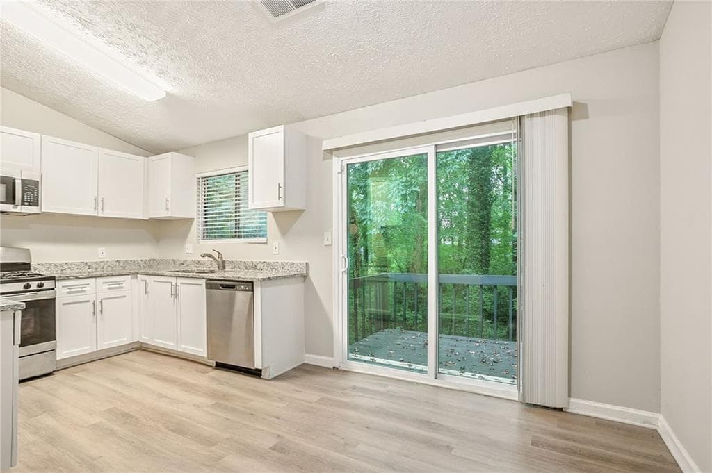 4 bedroom, 2 bathroom, 1,448 sq ft single family residence for sale at 4645 Hairston Crossing Place, Stone Mountain, GA 30083 — photo 8