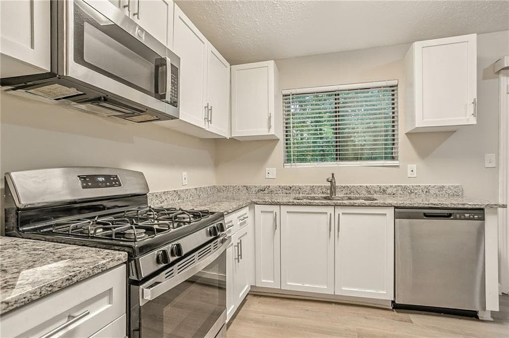 4 bedroom, 2 bathroom, 1,448 sq ft single family residence for sale at 4645 Hairston Crossing Place, Stone Mountain, GA 30083 — photo 10