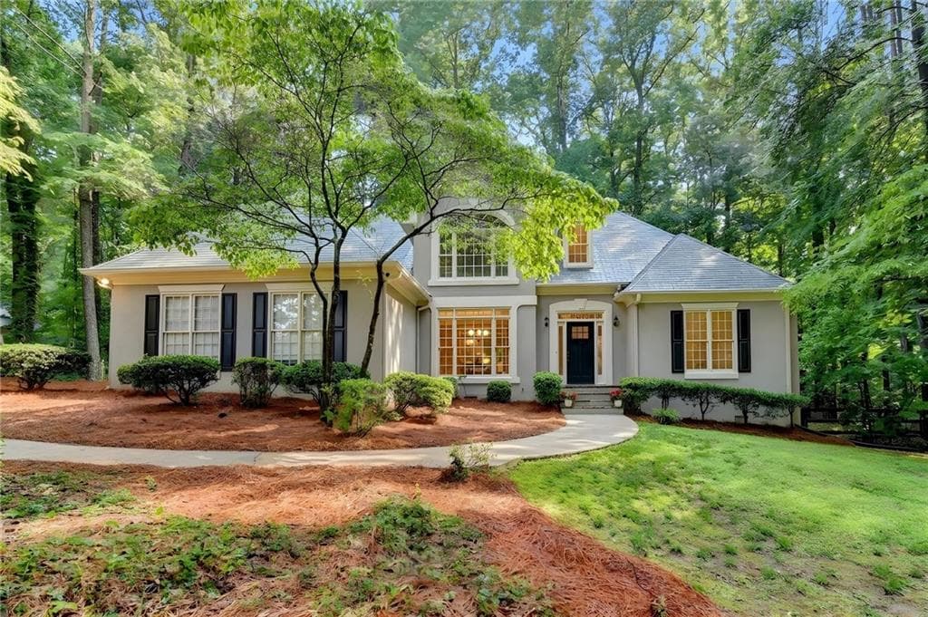 4 bedroom, 3 bathroom, 3,057 sq ft single family residence for sale at 6480 White Oak Drive, Cumming, GA 30040