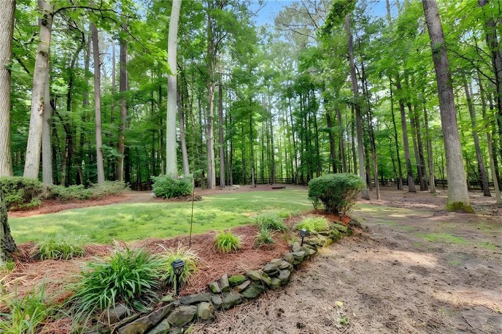 4 bedroom, 3 bathroom, 3,057 sq ft single family residence for sale at 6480 White Oak Drive, Cumming, GA 30040 — photo 2