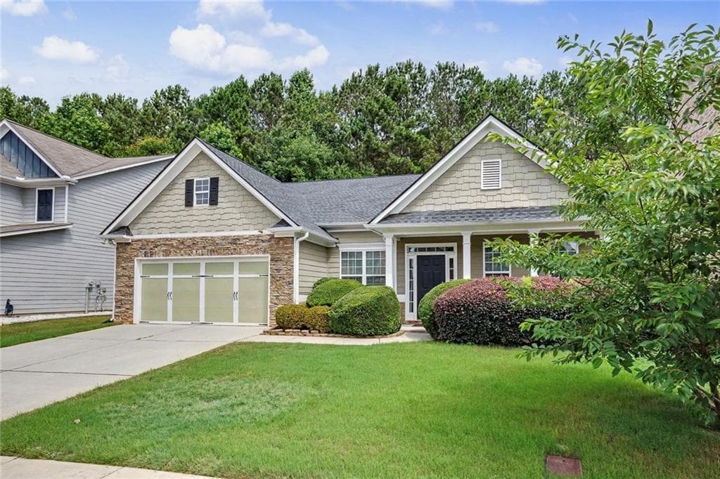 4 bedroom, 3 bathroom, 3,566 sq ft single family residence for sale at 3043 Bridge Walk Drive, Lawrenceville, GA 30044 — photo 2