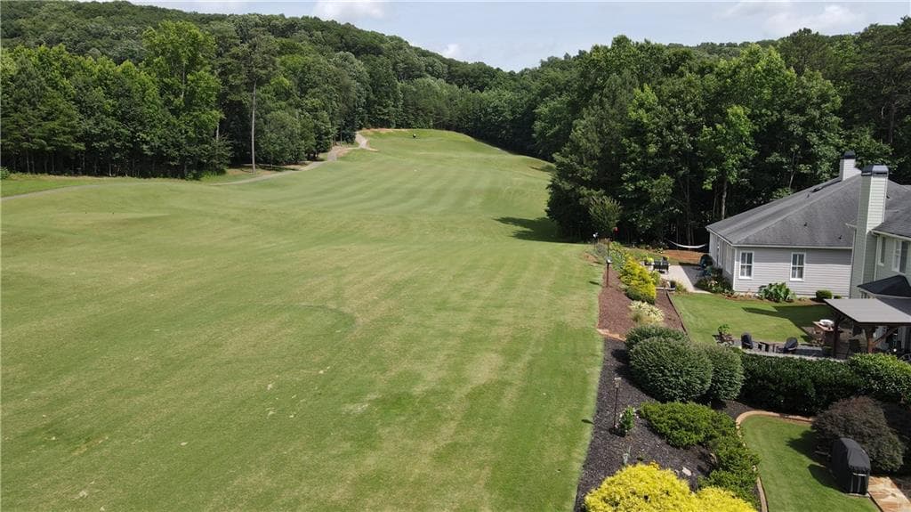 4 bedroom, 4 bathroom, 3,604 sq ft single family residence for sale at 6415 E Hills Court, Cumming, GA 30041 — photo 2