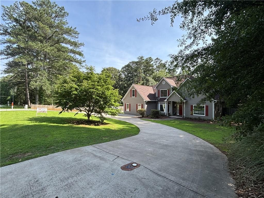 4 bedroom, 3 bathroom single family residence for rent at 3935 Melody Mizer Lane, Cumming, GA 30041 for $2,795 a month — photo 1 of 24