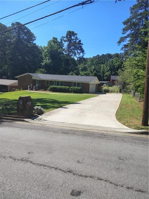 3 bedroom, 2 bathroom, 1,644 sq ft single family residence under contract at 4080 Somerled Trail, College Park, GA 30349 — photo 2